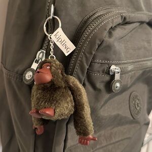 Kipling Backpack  green olive color, with monkey keychain,  new with tags